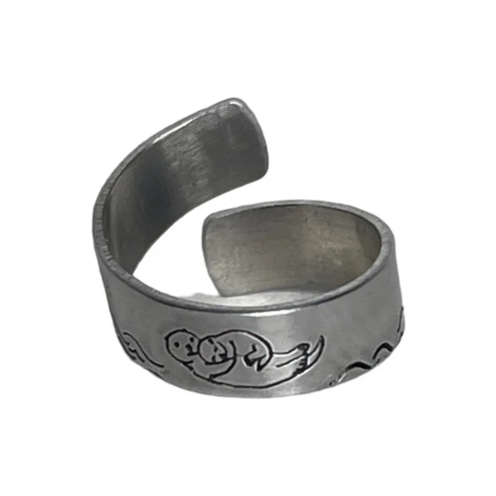 Handmade 8 stamped sea otter silver hypoallergenic aluminum adjustable wrap ring